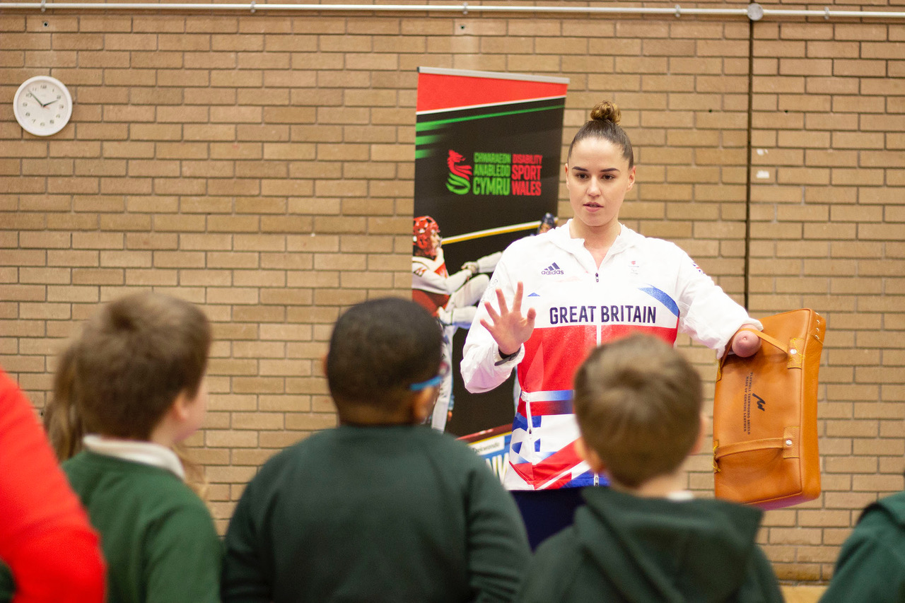 Beth Munro teaching children Taekwondo exercises