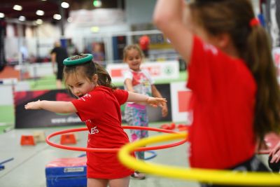 Child hula hooping at insport multisport event