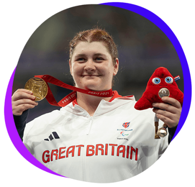 Sabrina celebrating with her gold medal at the Paris 2024 Paralympic Games