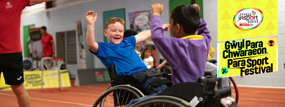Two participants play wheelchair basketball at insport Series Swansea 2025.